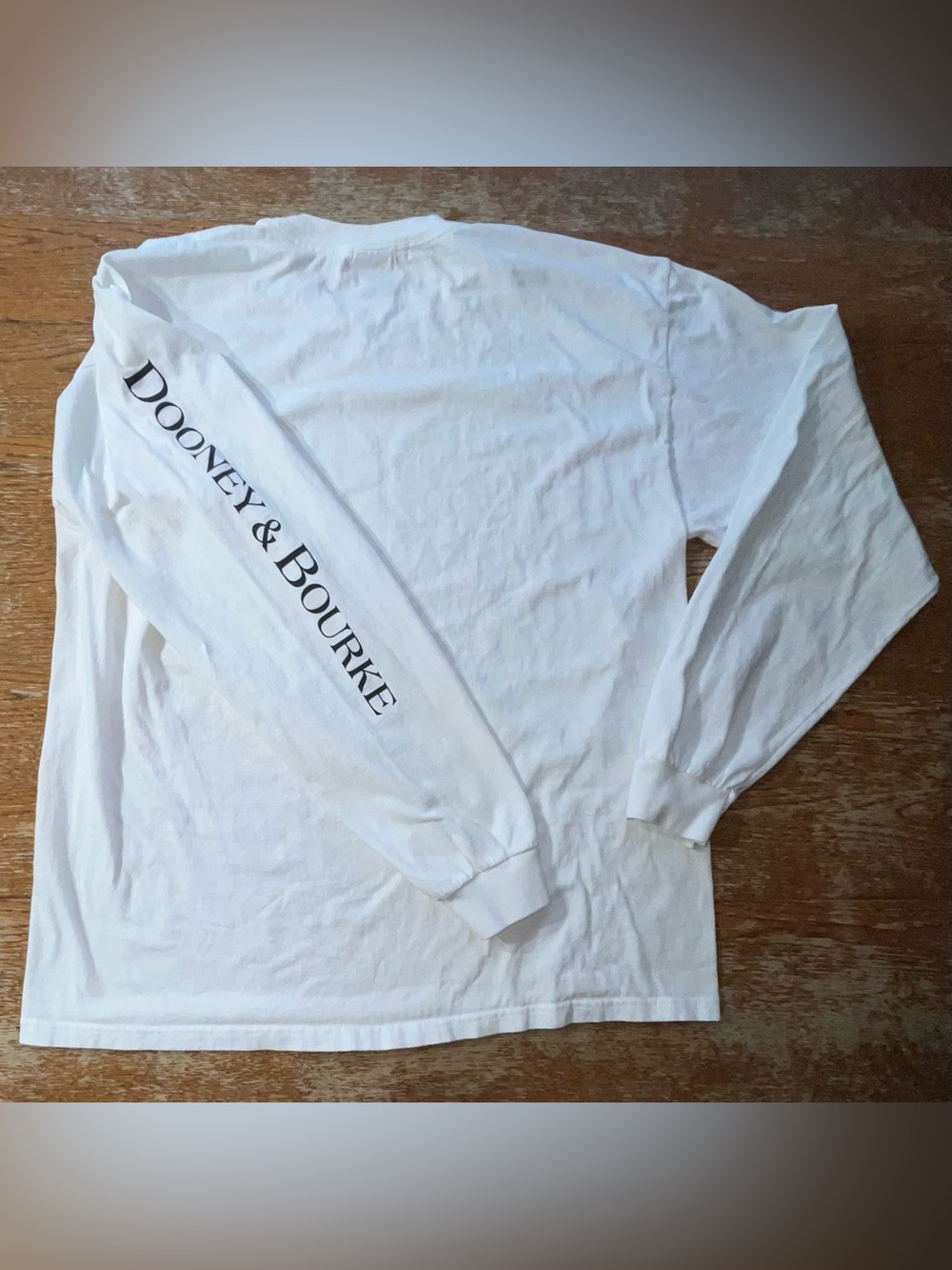 Anvil Long Sleeve White T-Shirt With  Dooney & Bourke print on the sleeve